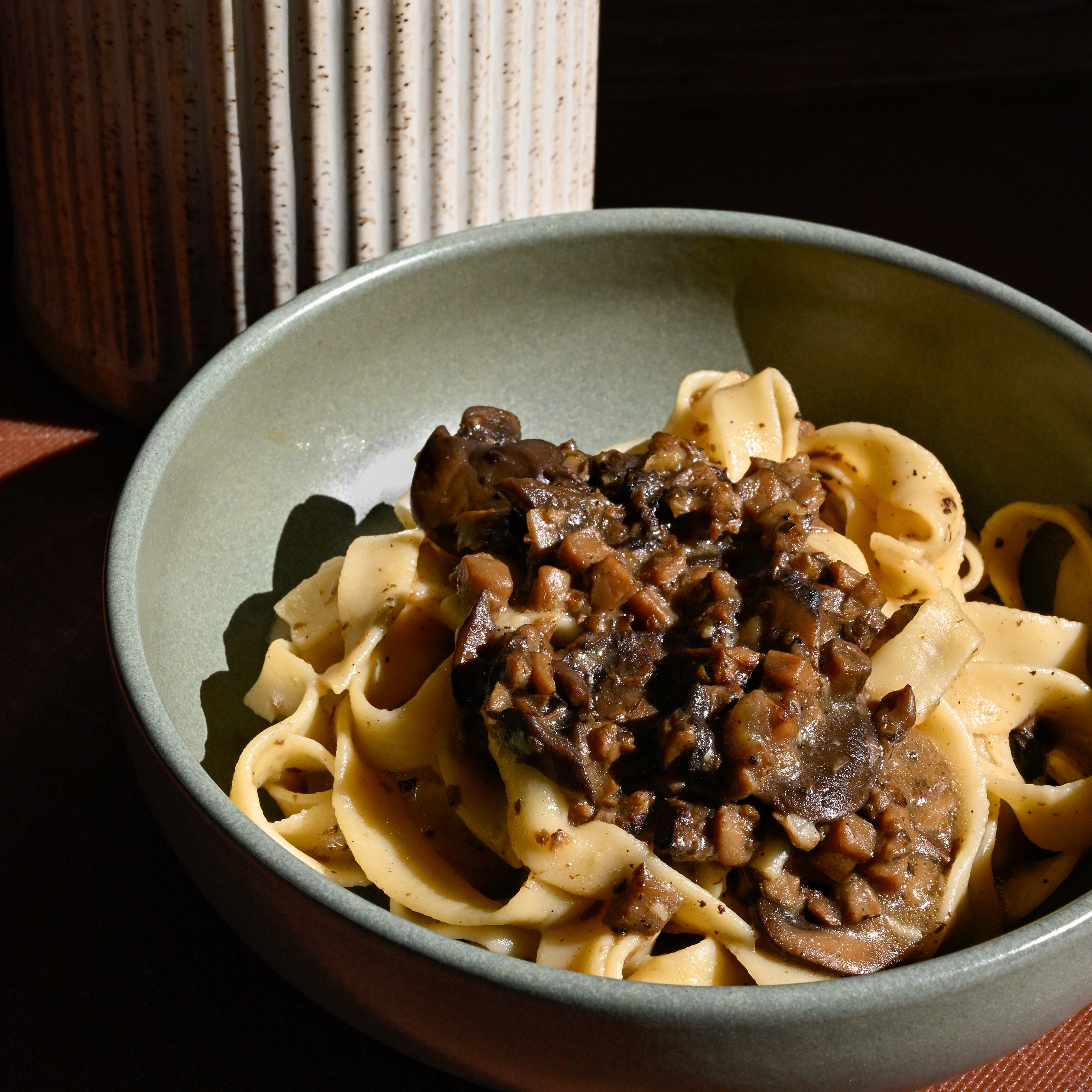 Bowl of fettuccine pasta with truffle mushroom ragu from Allegria