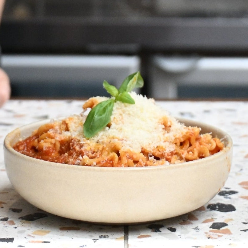 a bowl of pasta, mafalde with spicy arrabbiatta sauce from allegria
